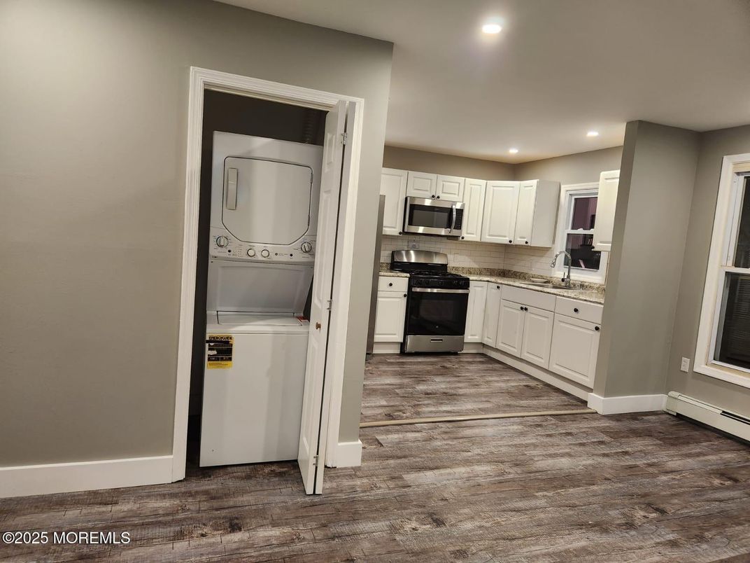 Interior, Kitchen, Recessed Lighting, Utility Closets, Washer, Wood Texture Flooring