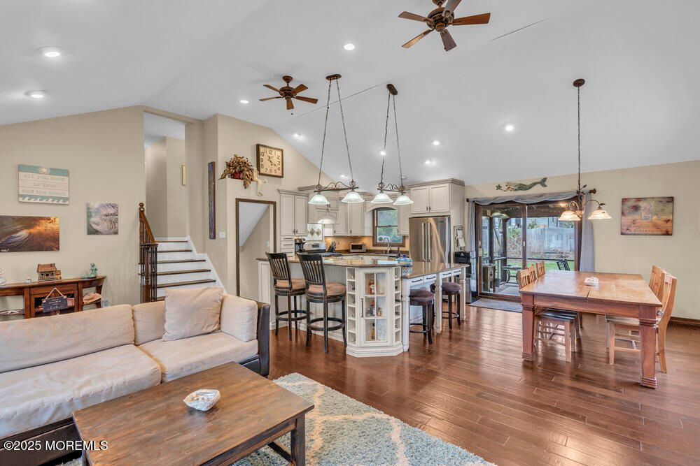 Dining room, Interior, Kitchen, Living room, Pendant Lights, Recessed Lighting, Stainless Steel Appliances, Wood Texture Flooring