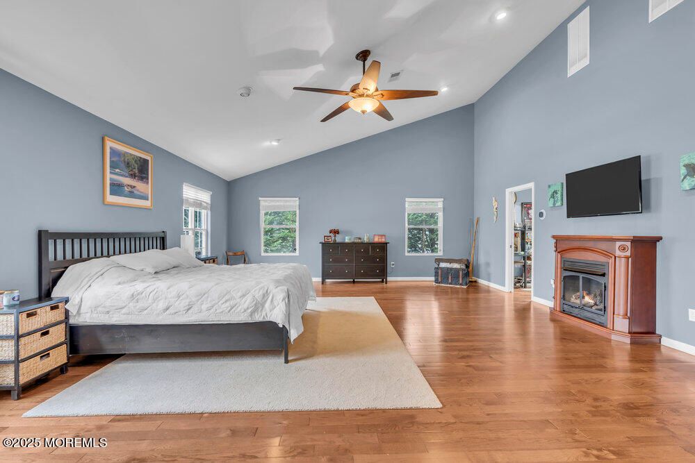 Bedroom, Fireplace, Interior, Recessed Lighting, Wood Texture Flooring