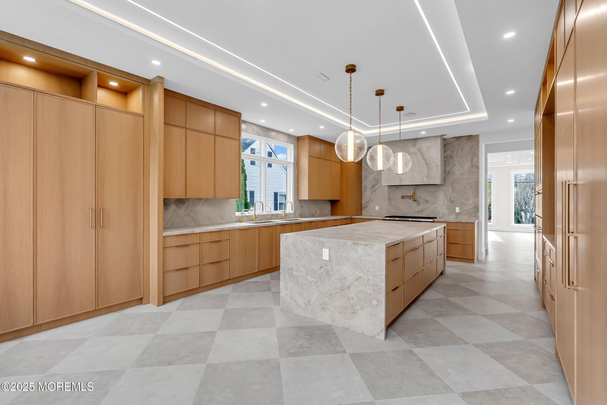 Interior, Kitchen, Marble Walls, Pendant Lights, Recessed Lighting, Stainless Steel Appliances