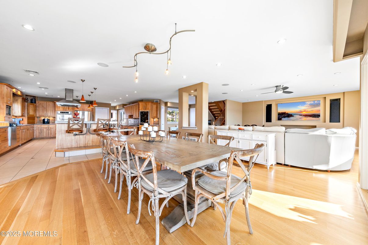 Dining room, Interior, Kitchen, Living room, Pendant Lights, Recessed Lighting, Stainless Steel Appliances, Wood Texture Flooring