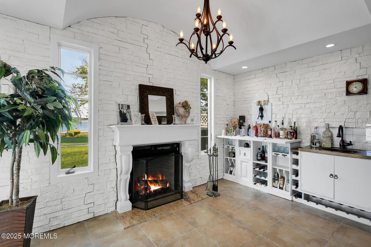 Chandelier, Fireplace, Interior, Recessed Lighting, Stone Walls