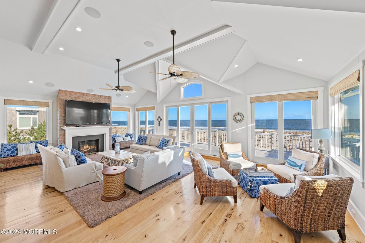Fireplace, Interior, Living room, Recessed Lighting, Water, Wood Texture Flooring