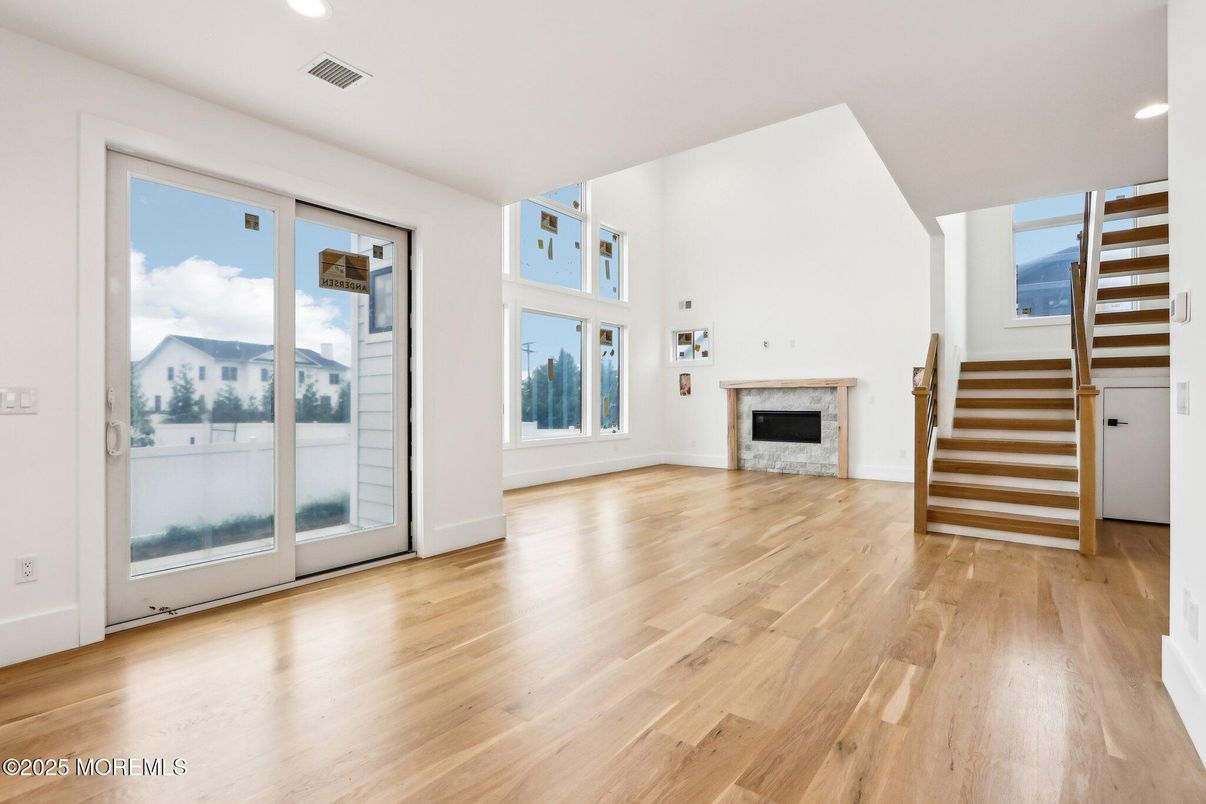 Empty room, Fireplace, Interior, Recessed Lighting, Wood Texture Flooring