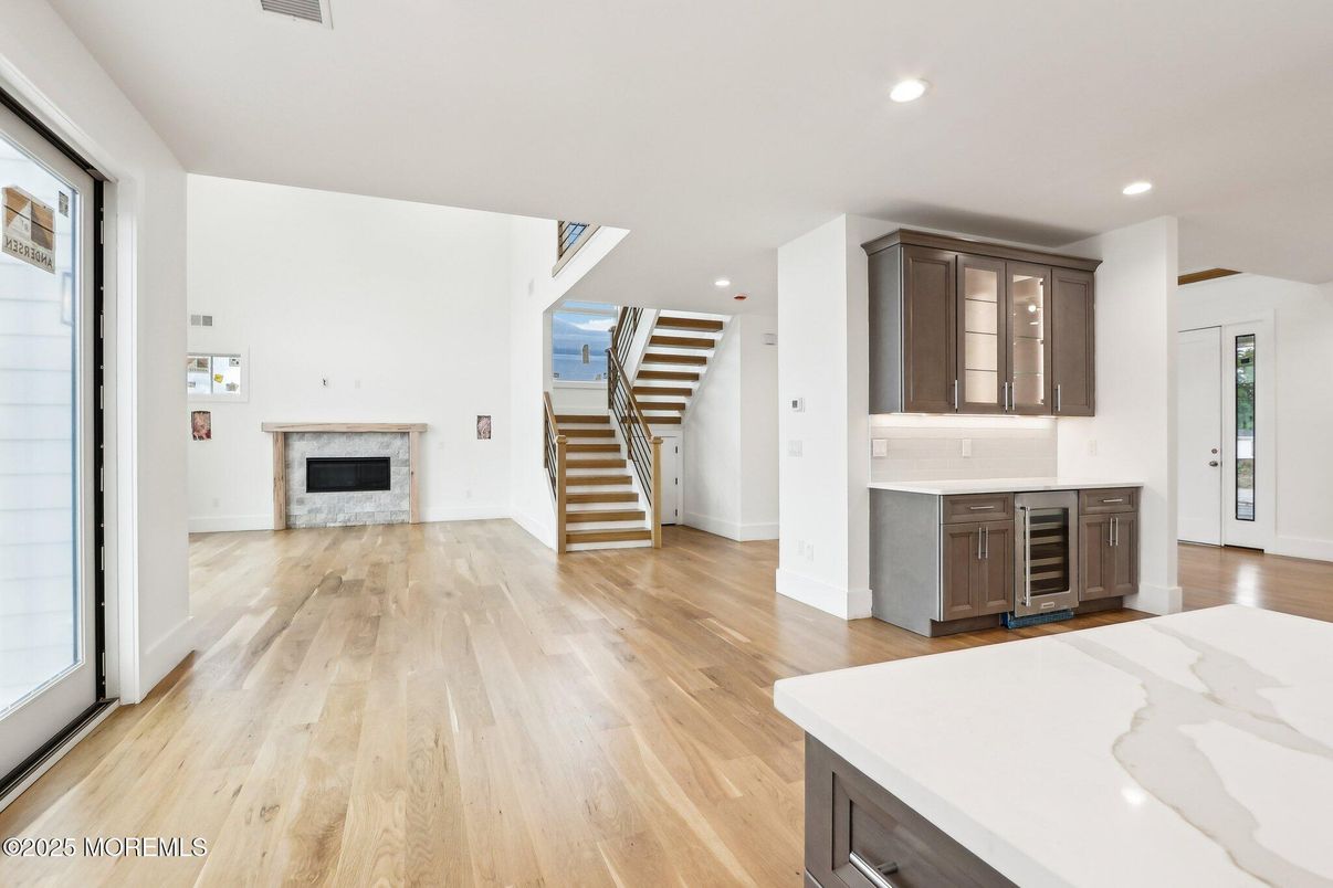 Empty room, Fireplace, Interior, Recessed Lighting, Wood Texture Flooring