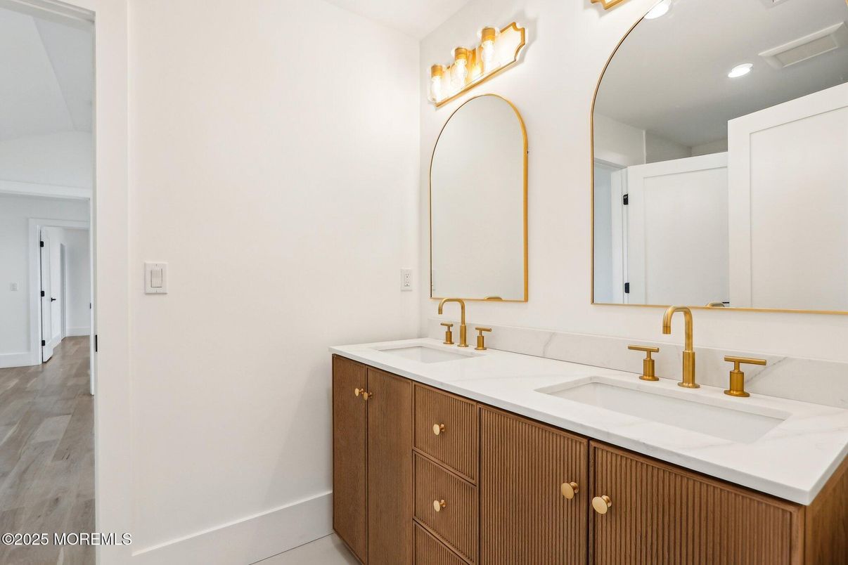 Bathroom, Dual Sink Vanities, Interior, Recessed Lighting, Wood Texture Flooring