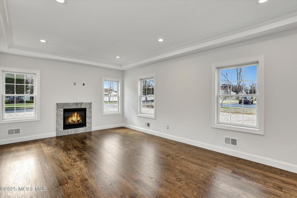 Empty room, Fireplace, Interior, Recessed Lighting, Wood Texture Flooring