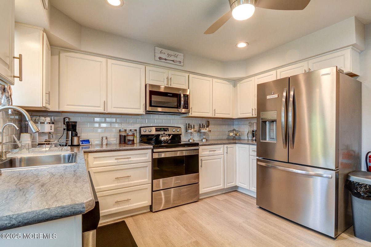 Interior, Kitchen, Recessed Lighting, Stainless Steel Appliances, Wood Texture Flooring