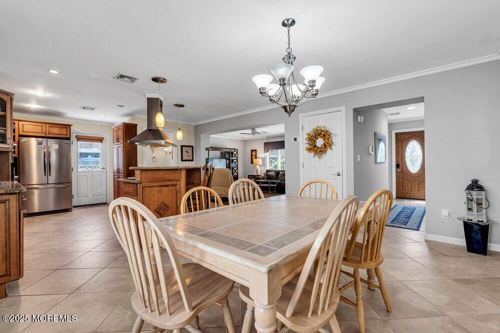 Chandelier, Dining room, Interior, Kitchen, Pendant Lights, Recessed Lighting, Stainless Steel Appliances