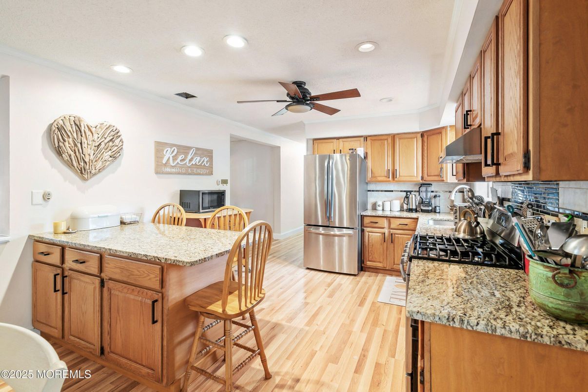 Interior, Kitchen, Recessed Lighting, Stainless Steel Appliances, Wood Texture Flooring