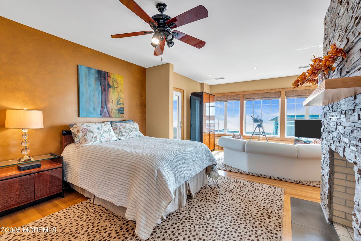 Bedroom, Fireplace, Interior, Recessed Lighting, Wood Texture Flooring