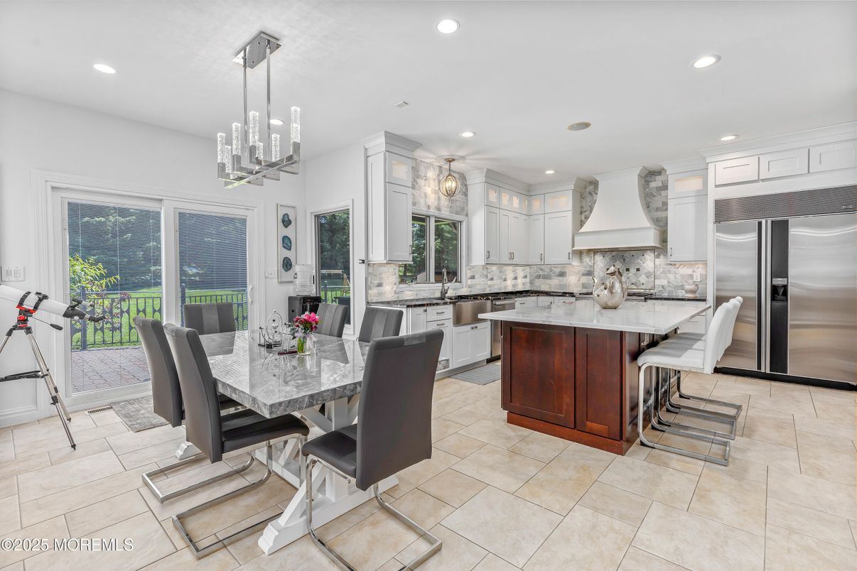 Chandelier, Dining room, Interior, Kitchen, Pendant Lights, Recessed Lighting, Stainless Steel Appliances