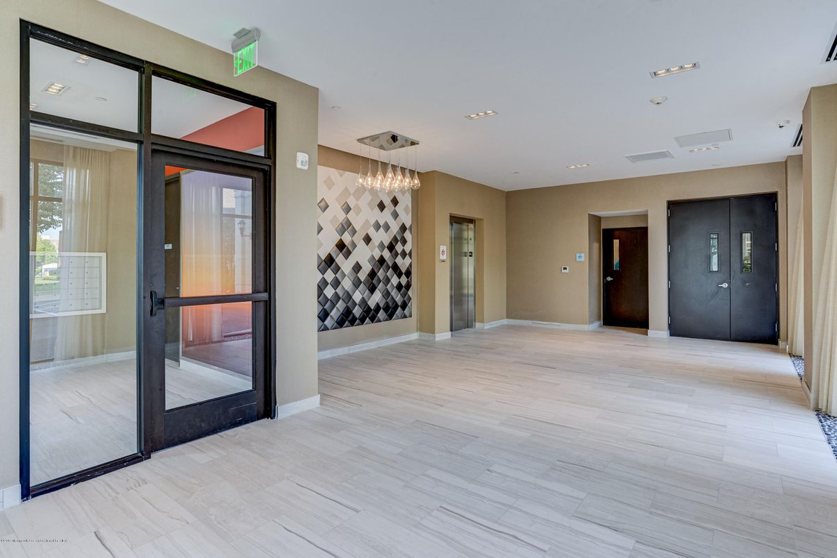 Elevator, Interior, Pendant Lights, Recessed Lighting, Wood Texture Flooring