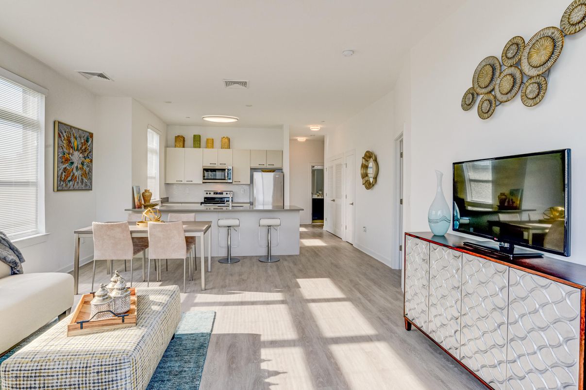 Dining room, Interior, Kitchen, Living room, Recessed Lighting, Stainless Steel Appliances, Wood Texture Flooring