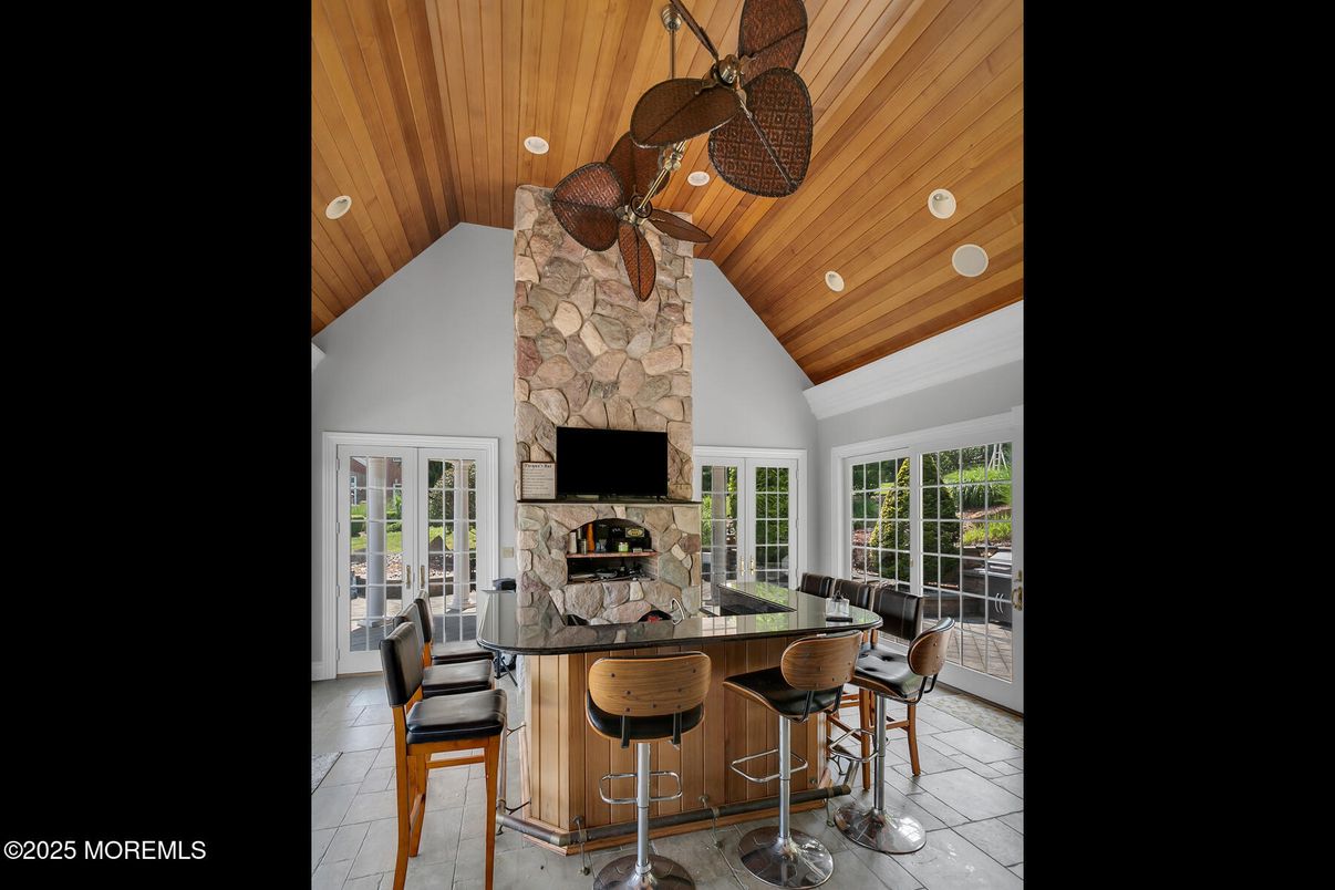 Fireplace, Interior, Recessed Lighting, Stone Walls, Wooden Ceilings