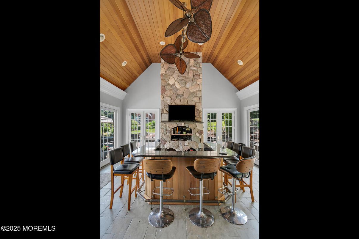 Fireplace, Interior, Recessed Lighting, Stone Walls, Wooden Ceilings