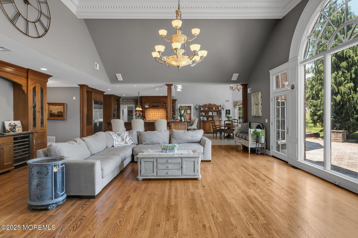 Chandelier, Dining room, Interior, Kitchen, Living room, Recessed Lighting, Wood Texture Flooring