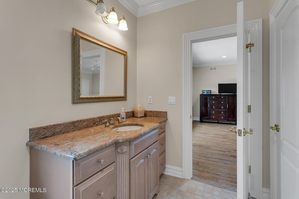 Bathroom, Dual Sink Vanities, Interior, Recessed Lighting, Wood Texture Flooring