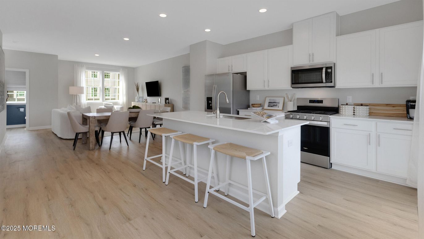 Dining room, Interior, Kitchen, Recessed Lighting, Stainless Steel Appliances, Wood Texture Flooring