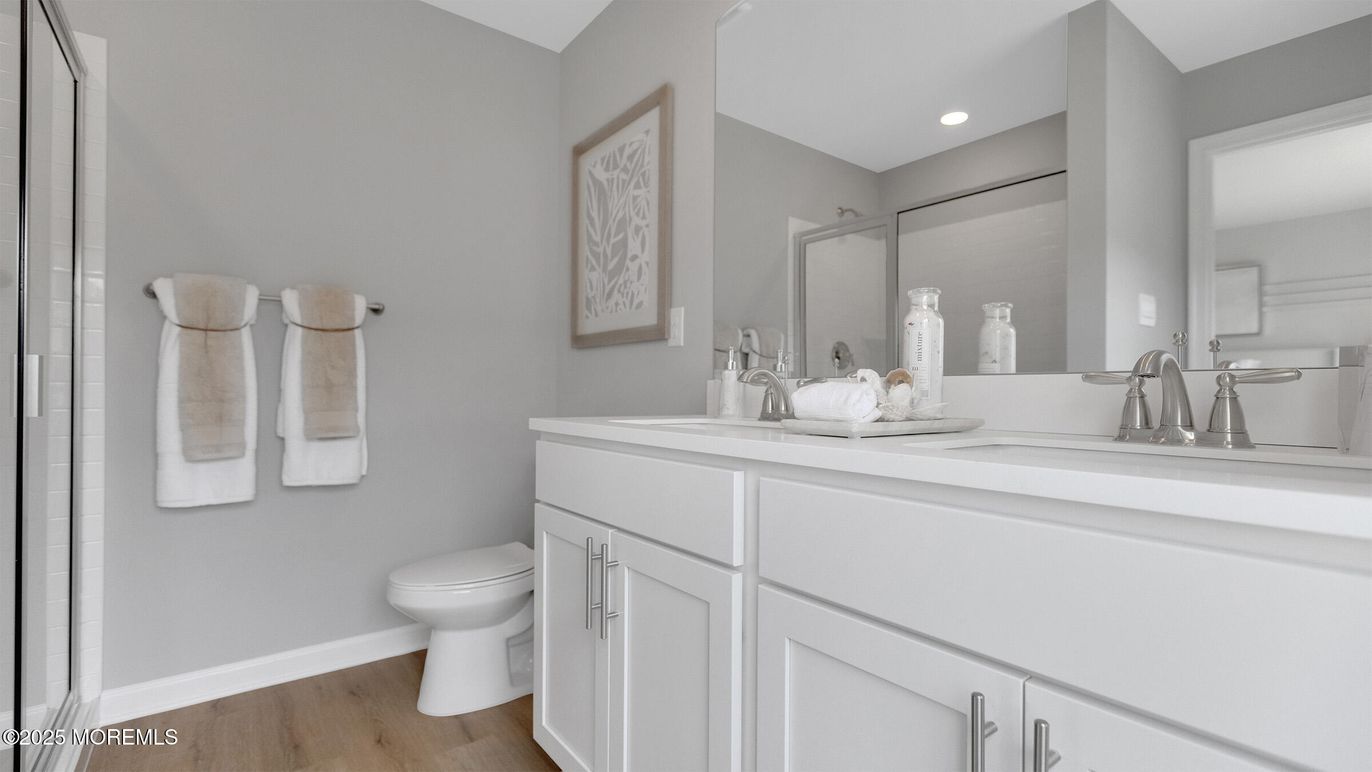 Bathroom, Dual Sink Vanities, Interior, Recessed Lighting, Wood Texture Flooring