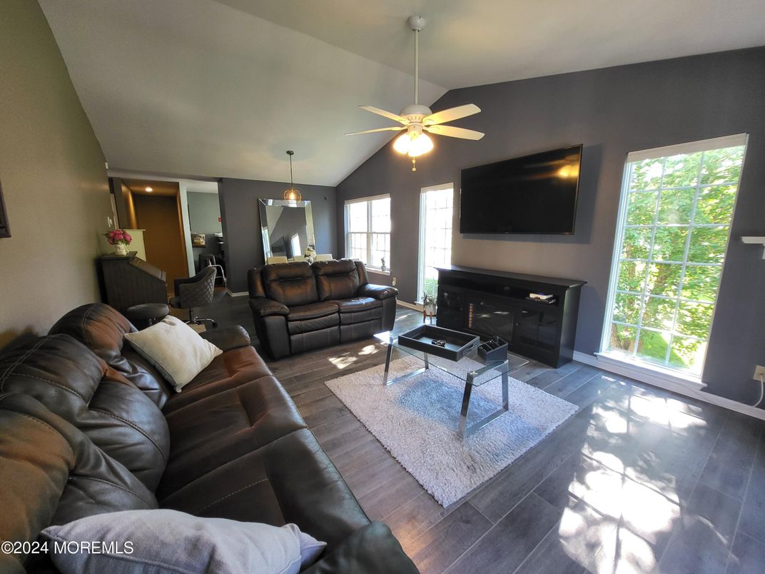 Dining room, Fireplace, Interior, Living room, Pendant Lights, Wood Texture Flooring