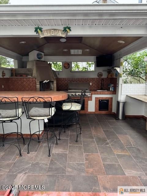 Exterior, Fireplace, Outdoor Kitchen
