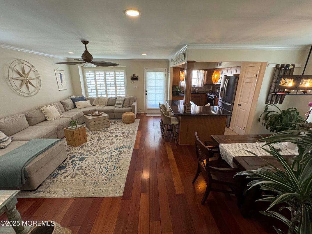 Dining room, Interior, Kitchen, Living room, Recessed Lighting, Stainless Steel Appliances, Wood Texture Flooring