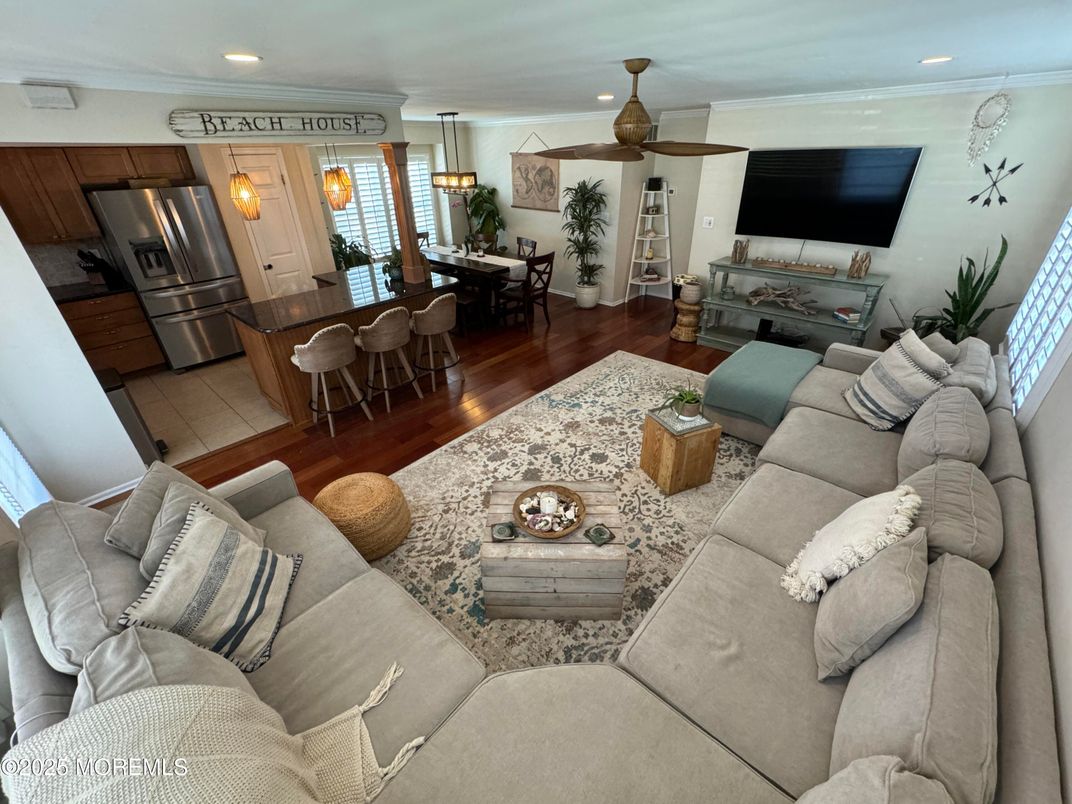 Dining room, Interior, Kitchen, Living room, Recessed Lighting, Stainless Steel Appliances, Wood Texture Flooring