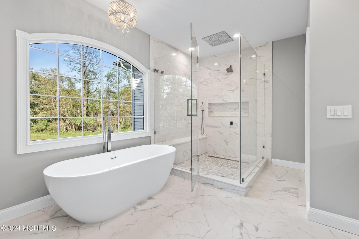 Bathroom, Free Standing Baths, Glass Shower, Interior, Marble, Marble Walls, Recessed Lighting