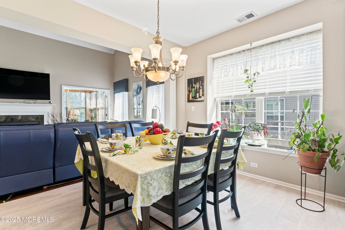 Chandelier, Dining room, Fireplace, Interior, Wood Texture Flooring