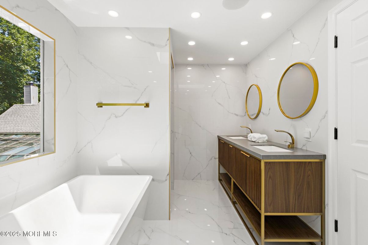 Bathroom, Dual Sink Vanities, Free Standing Baths, Interior, Marble, Marble Walls, Recessed Lighting