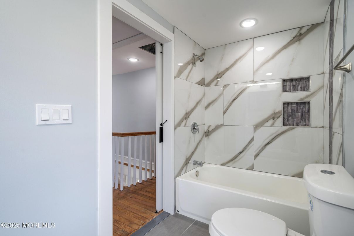 Bathroom, Interior, Marble Walls, Recessed Lighting, Wood Texture Flooring