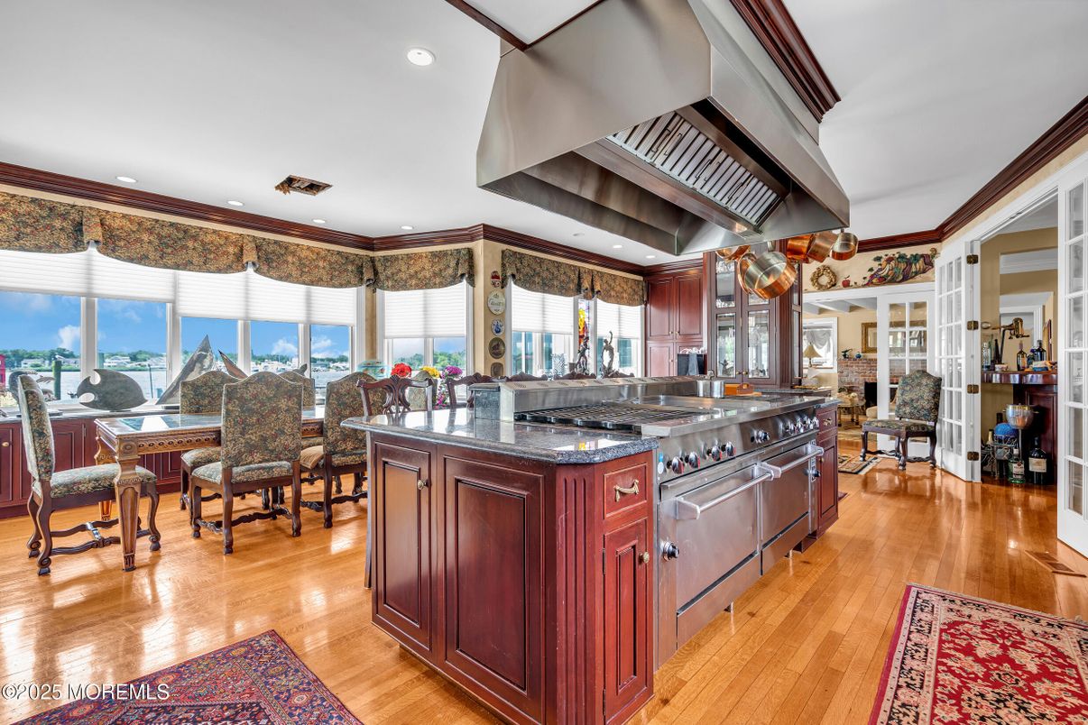 Dining room, Interior, Kitchen, Recessed Lighting, Stainless Steel Appliances, Wood Texture Flooring