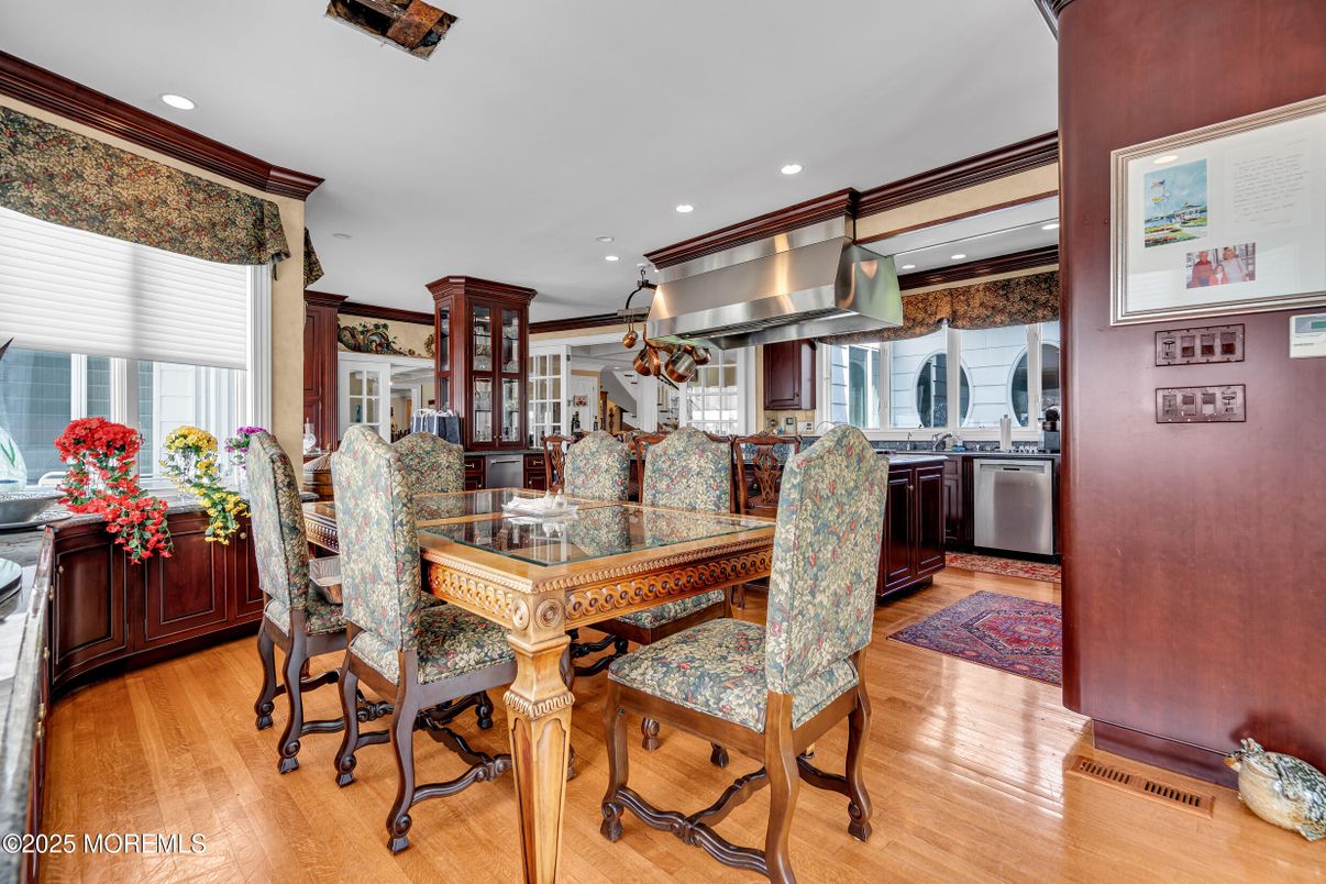 Dining room, Interior, Kitchen, Recessed Lighting, Stainless Steel Appliances, Wood Texture Flooring