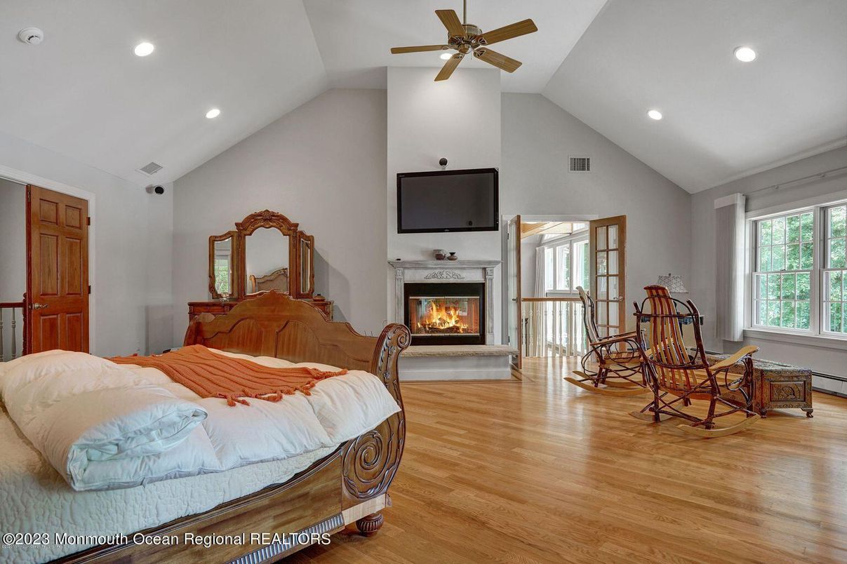 Bedroom, Fireplace, Interior, Recessed Lighting, Wood Texture Flooring