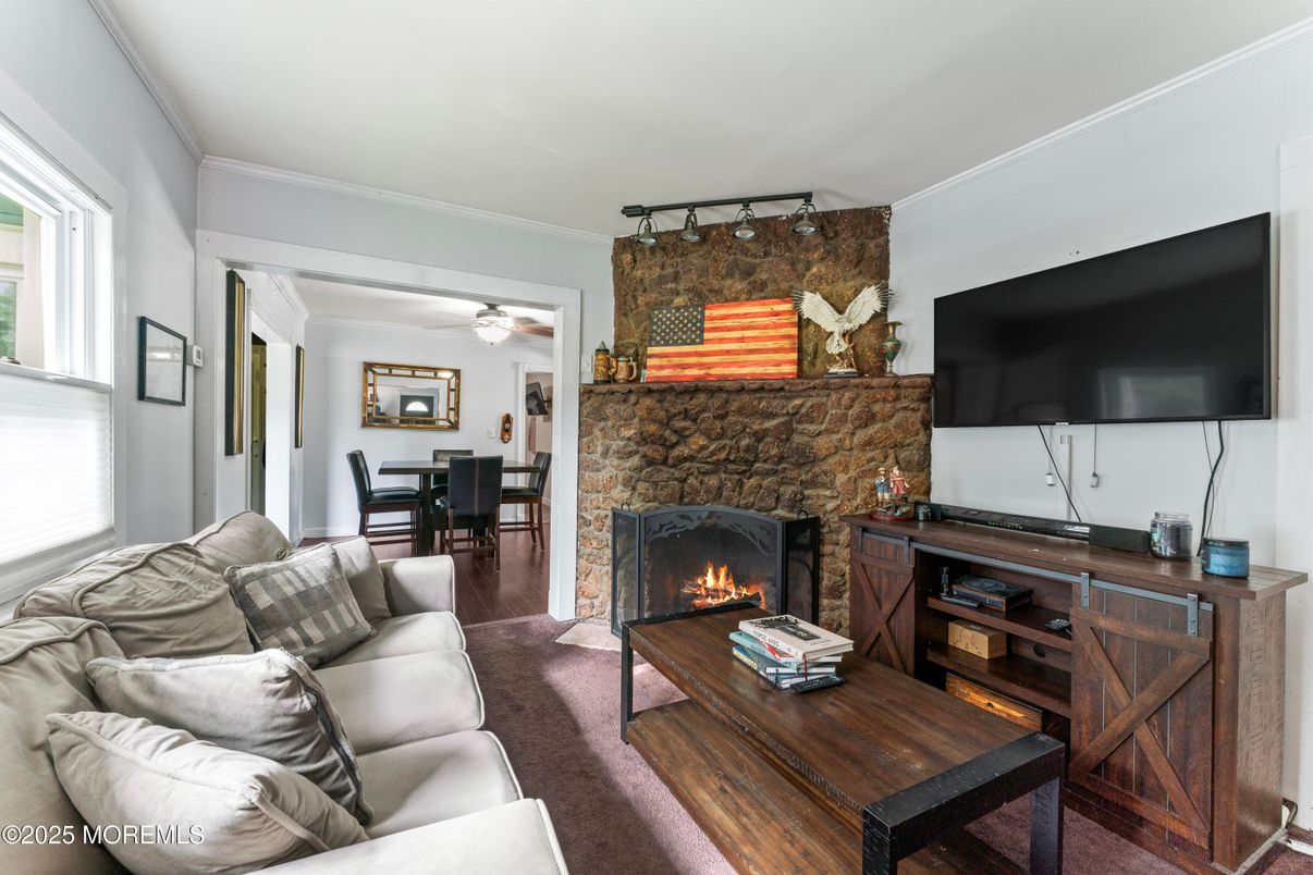 Dining room, Fireplace, Interior, Living room, Stone Walls, Wood Texture Flooring