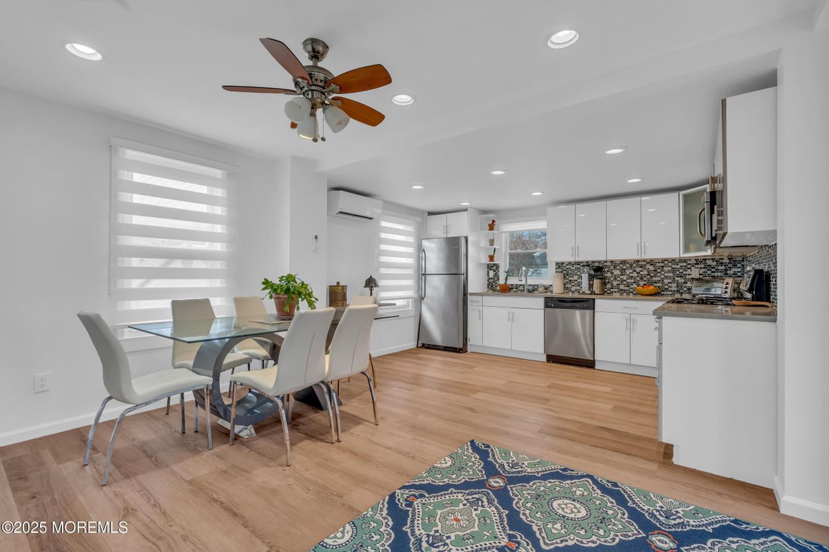 Dining room, Interior, Kitchen, Recessed Lighting, Stainless Steel Appliances, Wood Texture Flooring