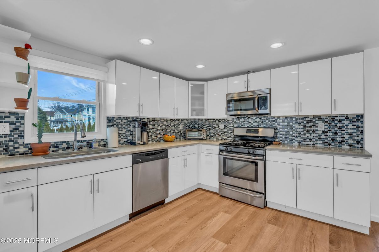 Interior, Kitchen, Recessed Lighting, Stainless Steel Appliances, Wood Texture Flooring
