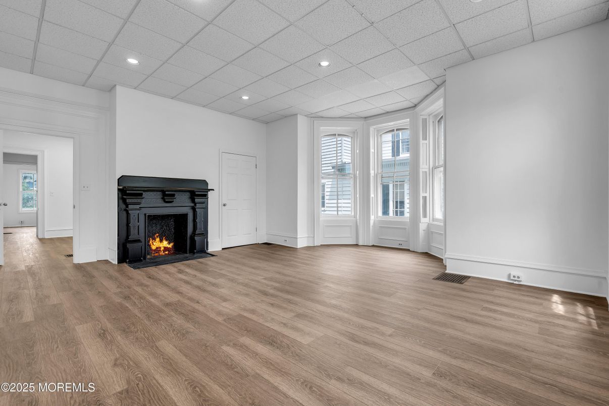 Empty room, Fireplace, Interior, Recessed Lighting, Wood Texture Flooring
