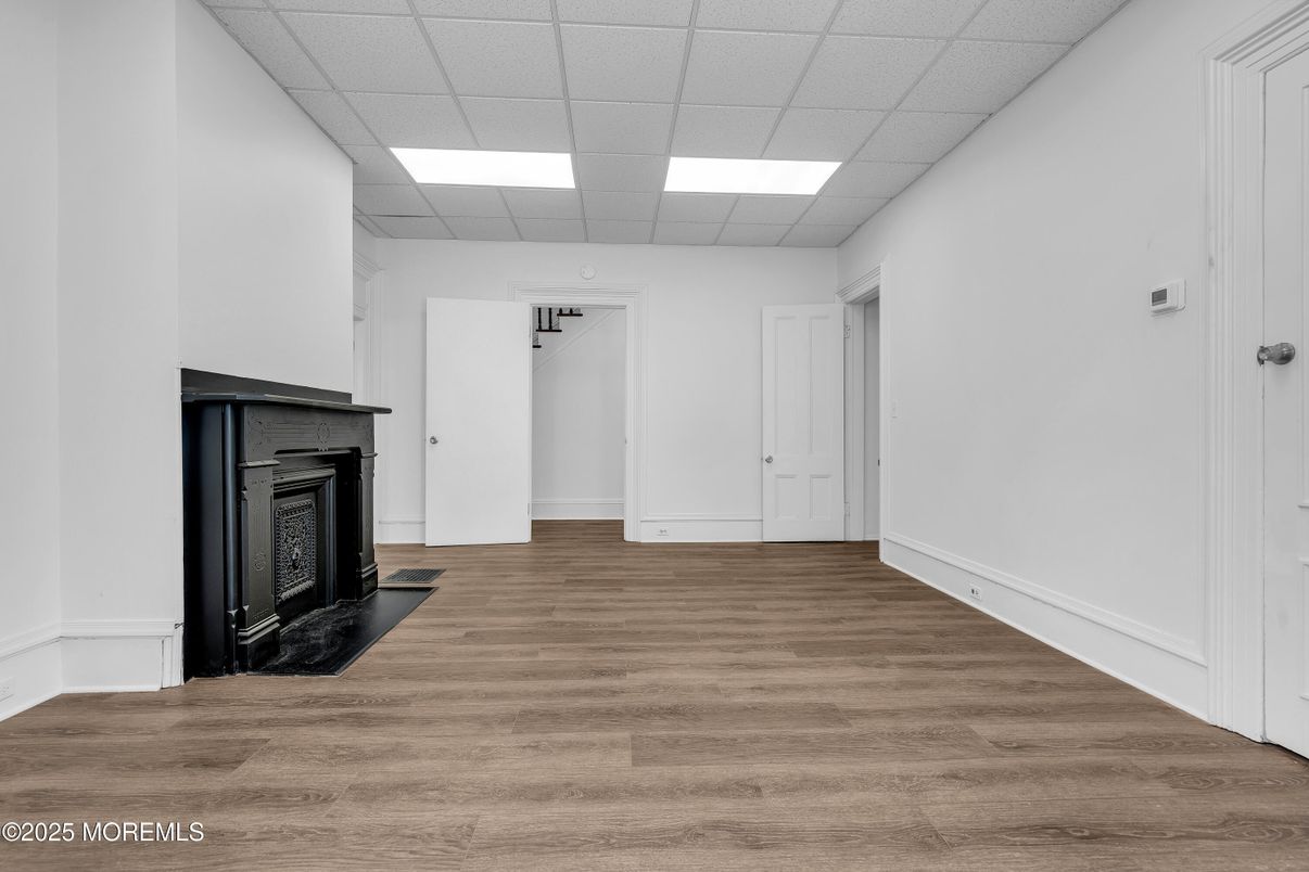 Empty room, Fireplace, Interior, Recessed Lighting, Wood Texture Flooring