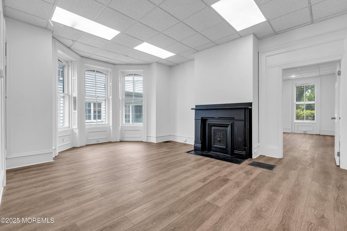 Empty room, Fireplace, Interior, Recessed Lighting, Wood Texture Flooring