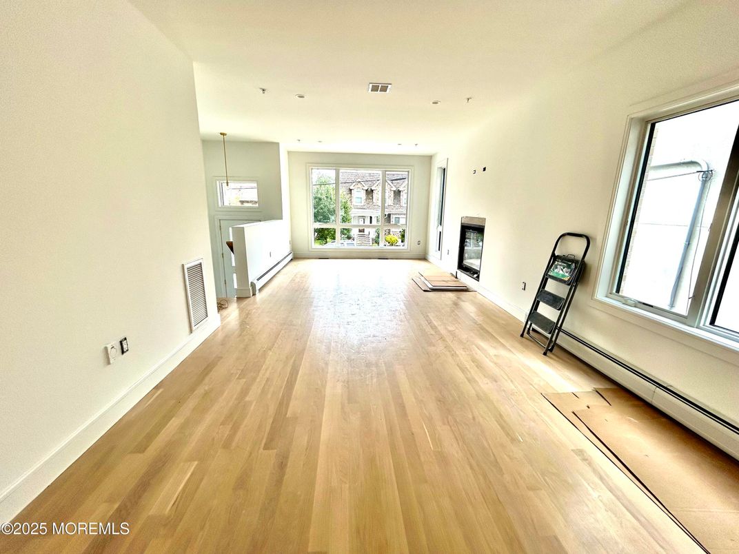 Empty room, Fireplace, Interior, Pendant Lights, Recessed Lighting, Wood Texture Flooring