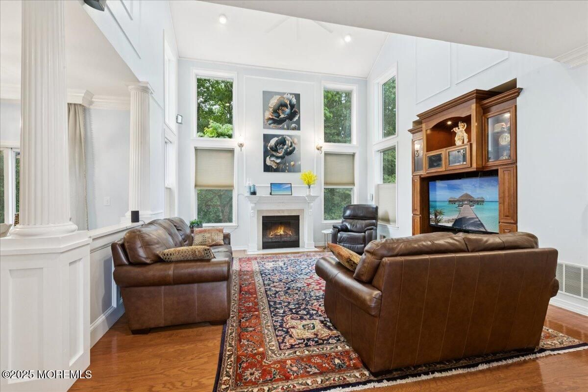 Fireplace, Interior, Living room, Recessed Lighting, Wood Texture Flooring