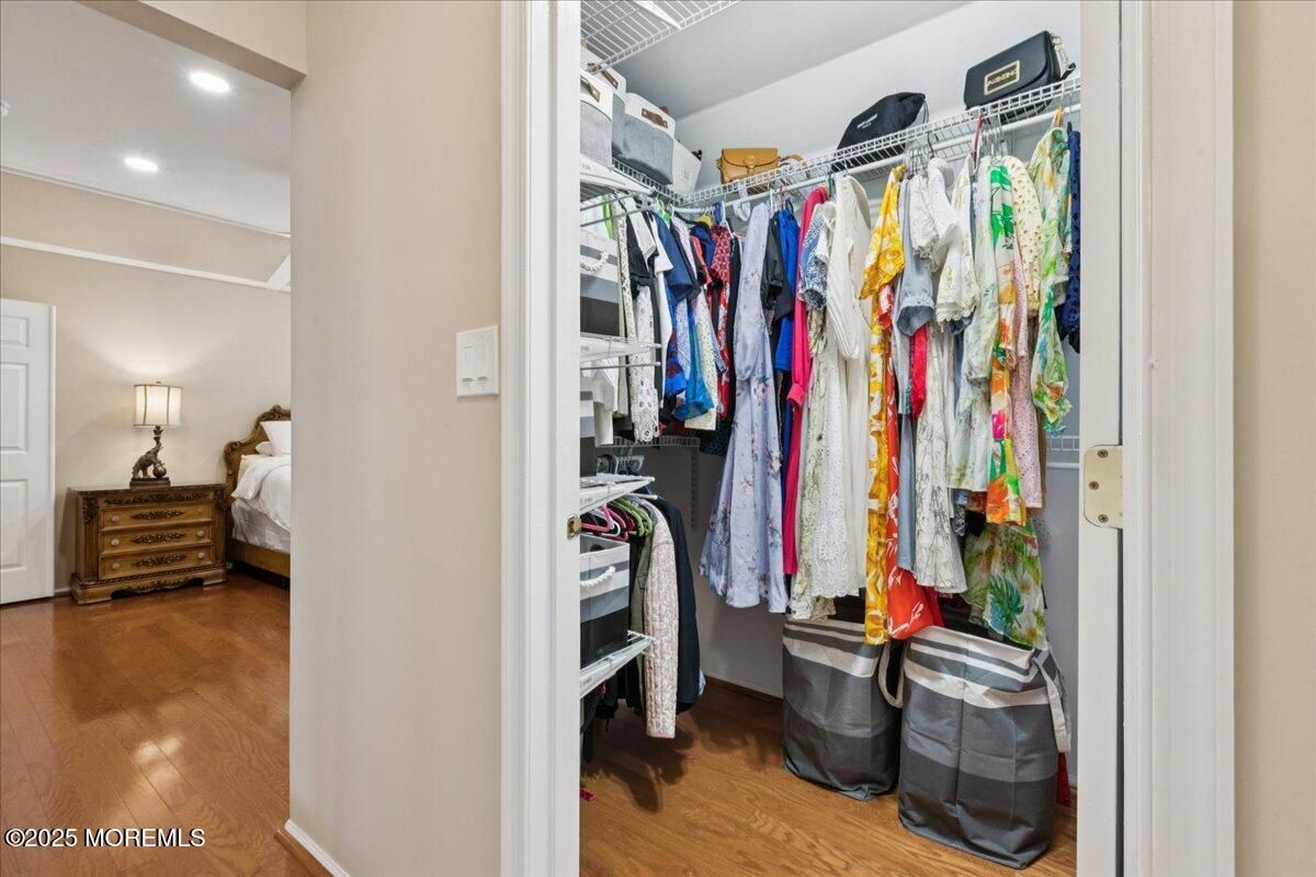Bedroom, Interior, Recessed Lighting, Walk-in Closets, Wood Texture Flooring
