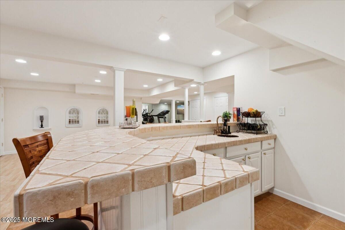 Fitness Equipment, Interior, Kitchen, Recessed Lighting, Tile Countertops