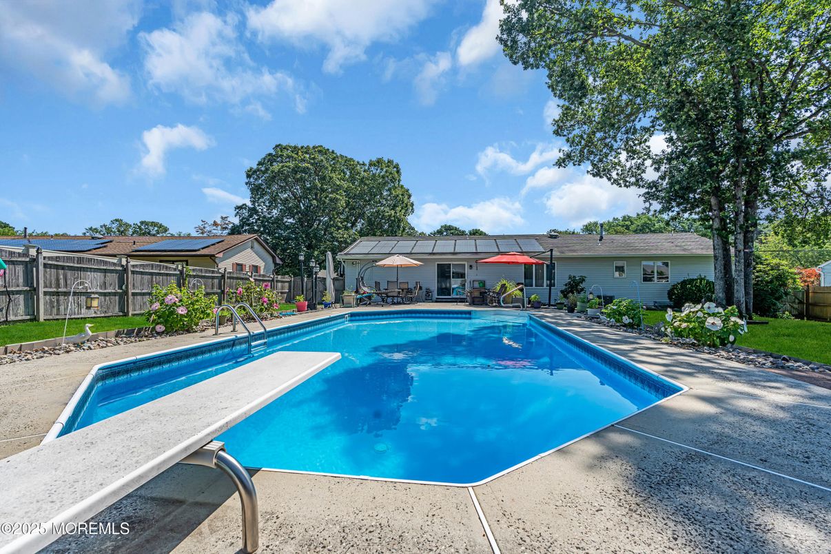 Exterior, Pool, Solar Panels