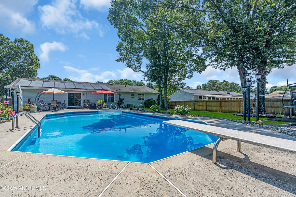 Exterior, Pool, Solar Panels