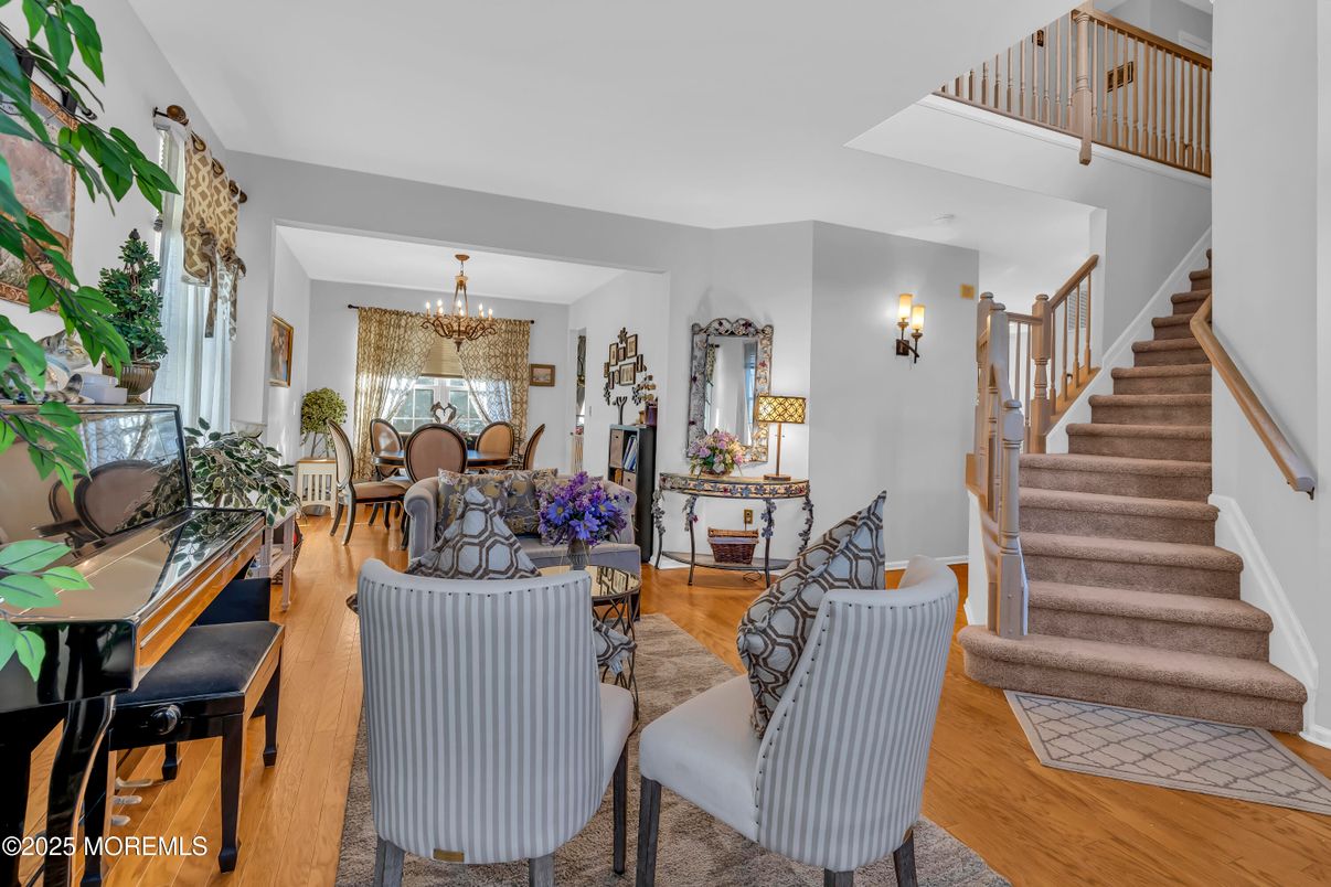Chandelier, Dining room, Interior, Living room, Piano, Wood Texture Flooring