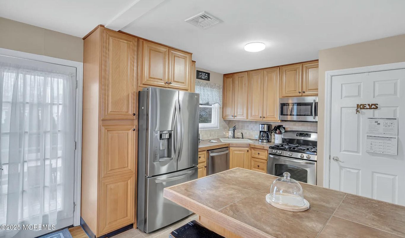 Interior, Kitchen, Stainless Steel Appliances, Tile Countertops