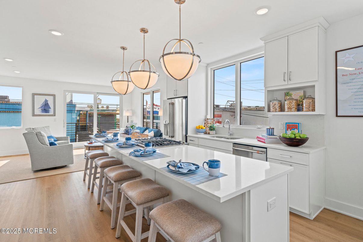 Interior, Kitchen, Living room, Pendant Lights, Recessed Lighting, Stainless Steel Appliances, Water, Wood Texture Flooring